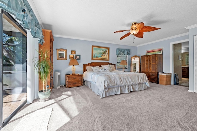 carpeted bedroom featuring ceiling fan, crown molding, a textured ceiling, and access to exterior