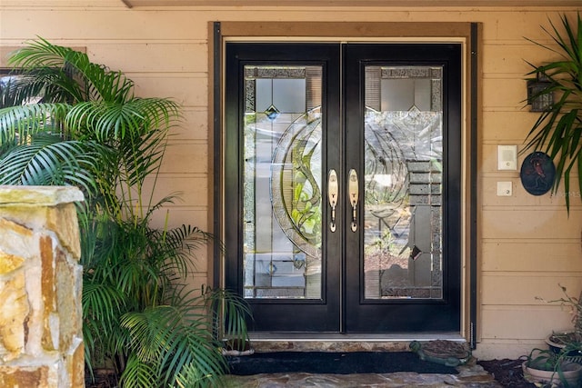 doorway to property featuring french doors