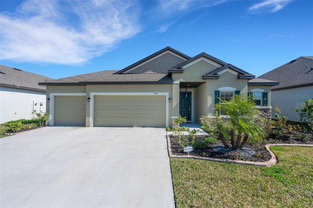 ranch-style home featuring a garage