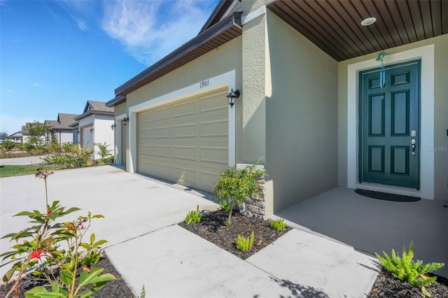 entrance to property featuring a garage