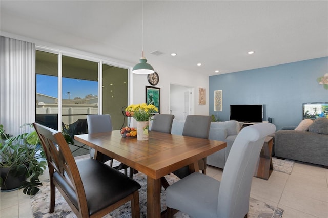 dining space with light tile patterned floors