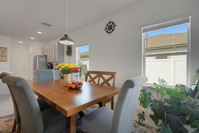 view of tiled dining space