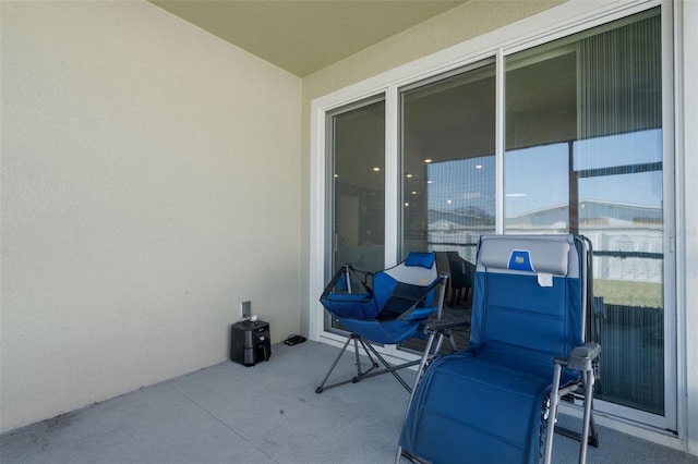 view of patio with a balcony