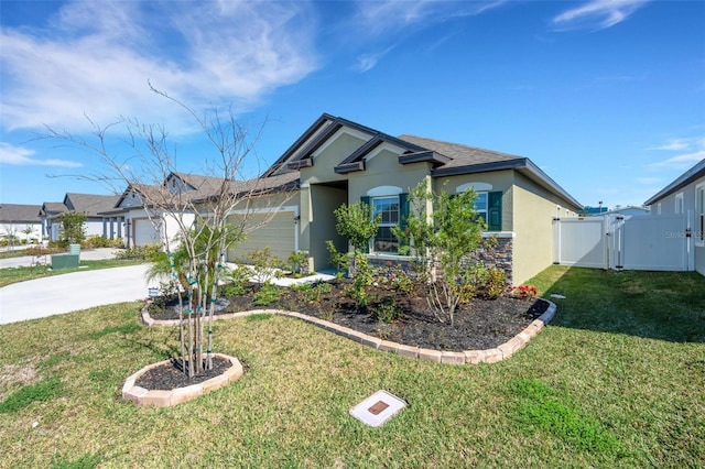 ranch-style house featuring a garage and a front lawn