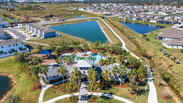 drone / aerial view with a water view