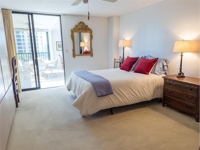 5780 Midnight Pass Rd Unit 303B, Sarasota, FL 34242 - carpeted bedroom featuring access to outside and ceiling fan