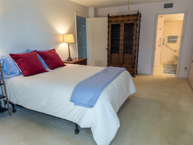 5780 Midnight Pass Rd Unit 303B, Sarasota, FL 34242 - carpeted bedroom with ensuite bathroom