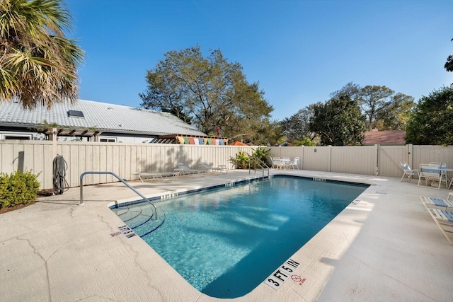 view of pool featuring a patio area