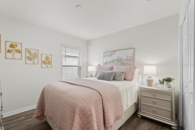 bedroom featuring dark hardwood / wood-style floors