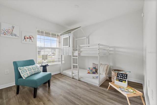 bedroom with wood-type flooring