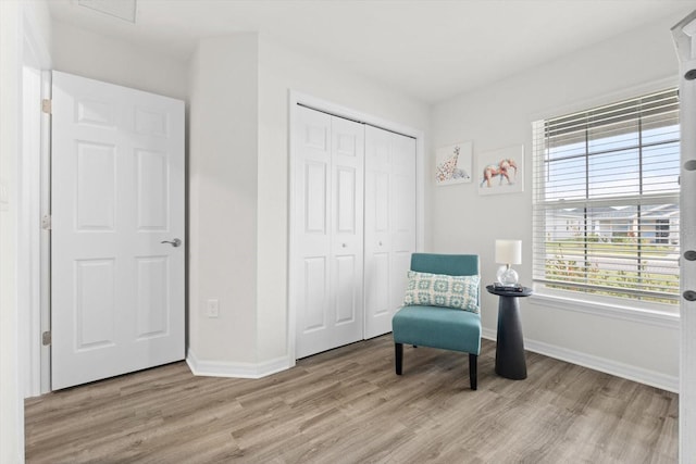 living area featuring light wood-type flooring