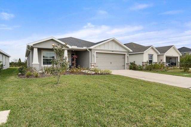 view of front of home featuring a garage and a front yard