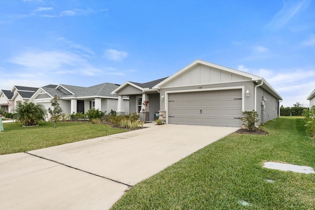 ranch-style home with a garage and a front lawn