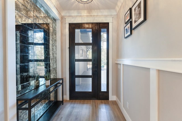 foyer with wood-type flooring