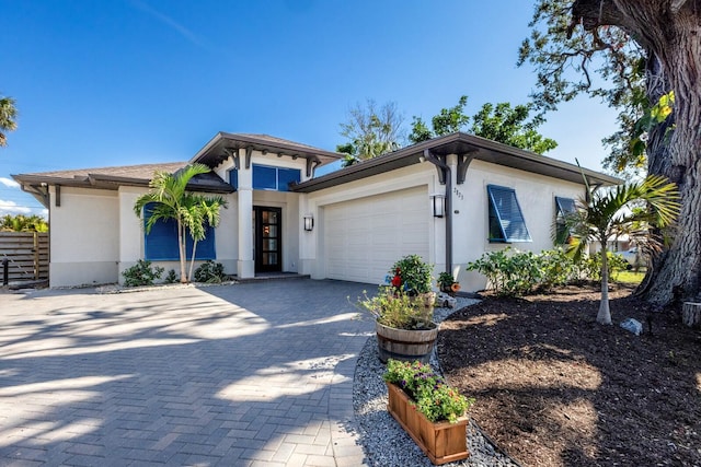 view of front of property with a garage