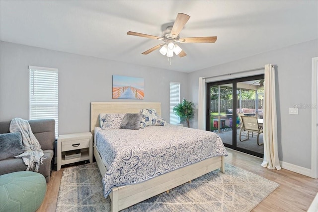 bedroom with ceiling fan, access to exterior, and light hardwood / wood-style floors