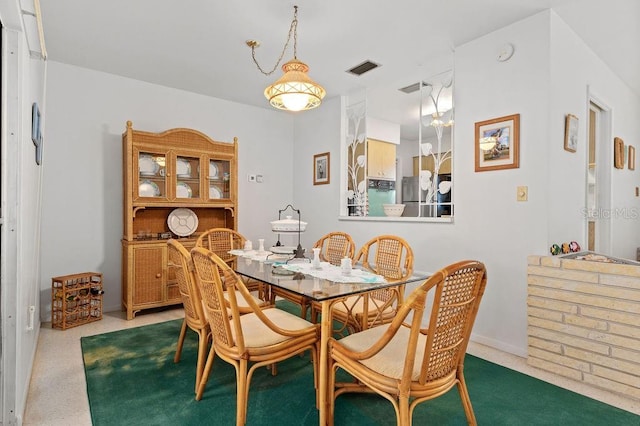 view of carpeted dining room