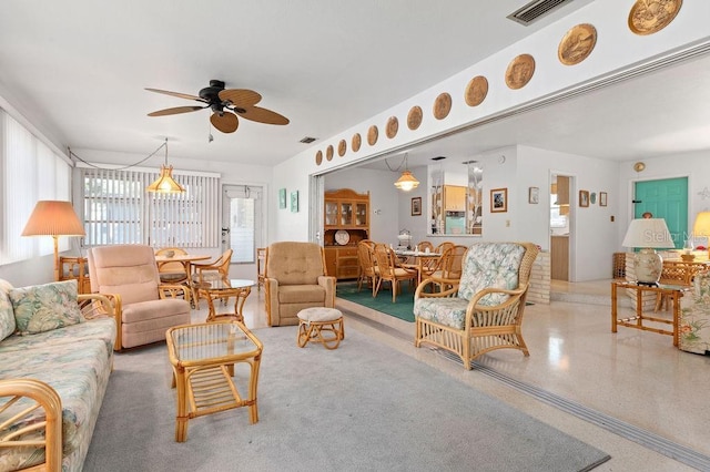 living room featuring ceiling fan