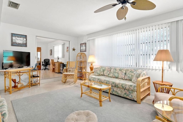 living room featuring ceiling fan