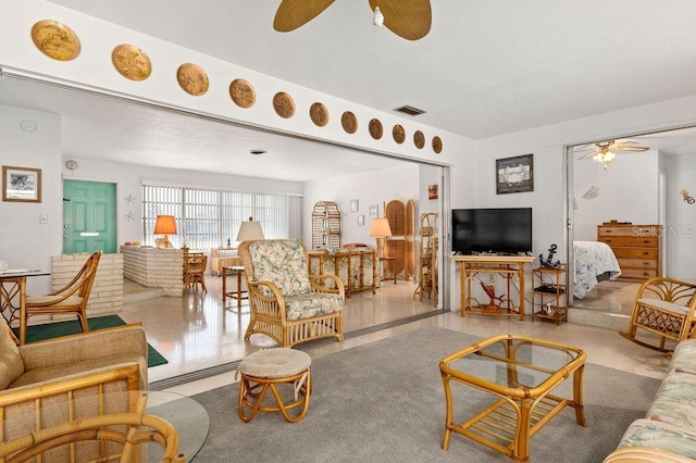 living room with ceiling fan