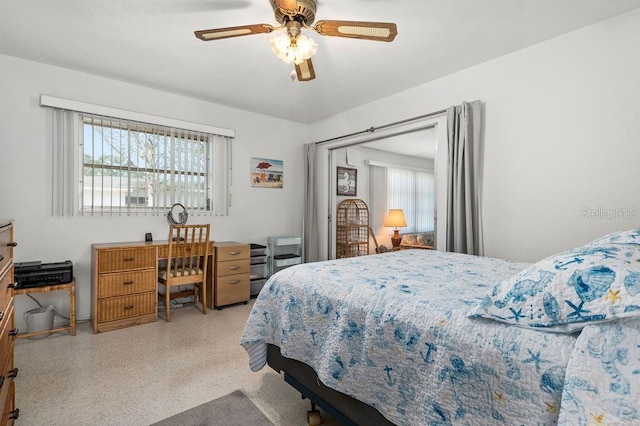 bedroom featuring ceiling fan