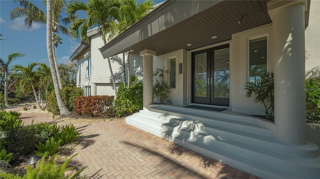 entrance to property featuring french doors