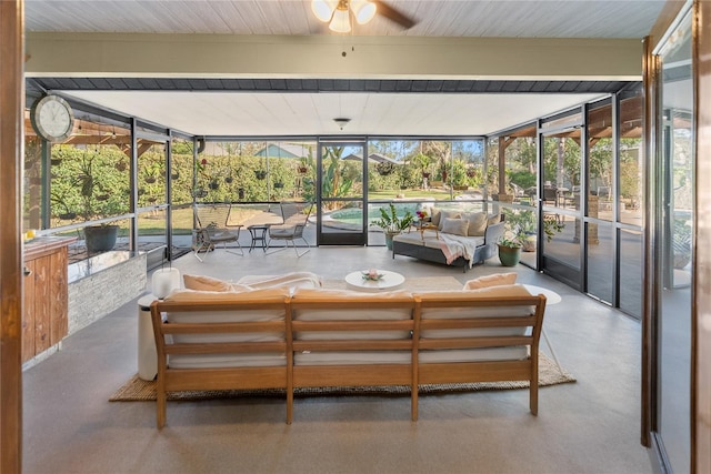 sunroom / solarium with ceiling fan