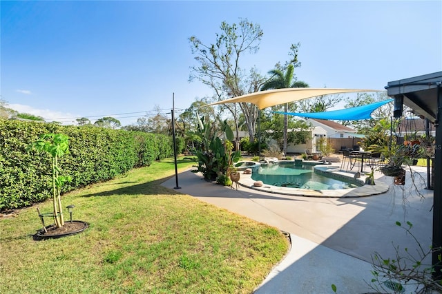 view of swimming pool featuring a patio area and a lawn