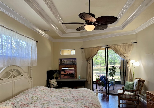 15207 17th Ave E, Bradenton, FL 34212 - bedroom with dark wood finished floors, access to outside, crown molding, a tray ceiling, and ceiling fan