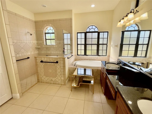 15207 17th Ave E, Bradenton, FL 34212 - bathroom featuring vanity, a bath, walk in shower, tile patterned floors, and recessed lighting