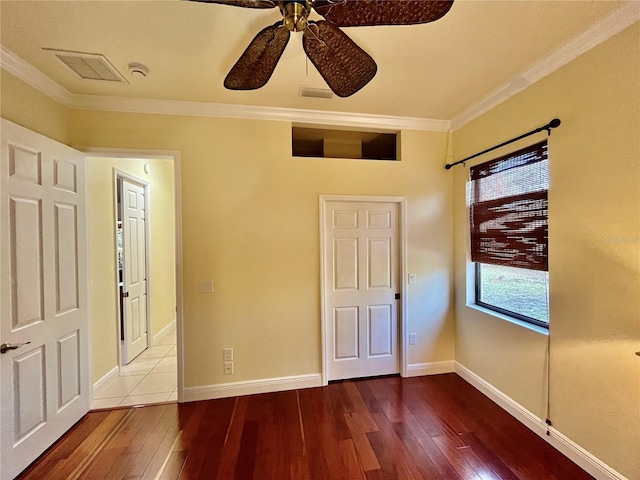 15207 17th Ave E, Bradenton, FL 34212 - unfurnished bedroom featuring ornamental molding, hardwood / wood-style flooring, and ceiling fan