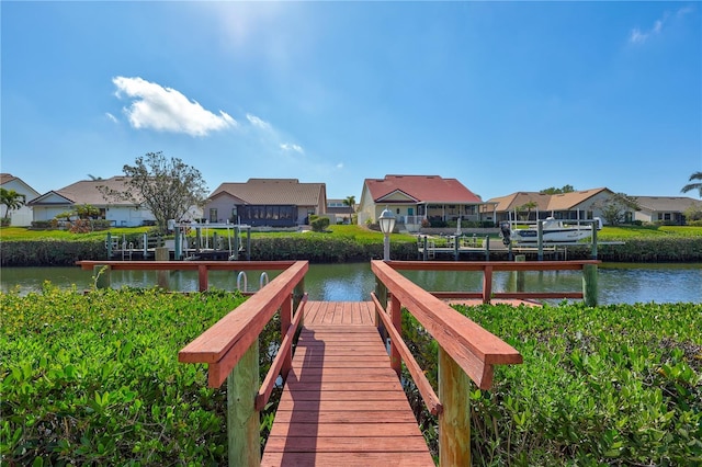 104 Inlets Blvd Unit 104, Nokomis, FL 34275 - dock featuring a residential view and a water view