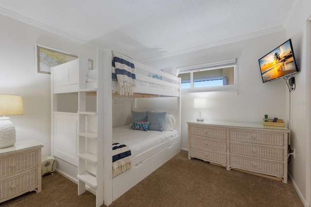 bedroom featuring ornamental molding and dark colored carpet