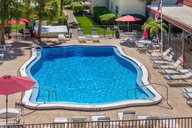 view of pool featuring a patio