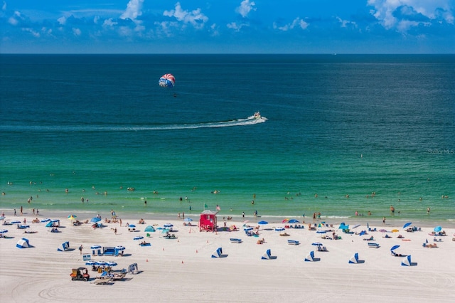 property view of water featuring a beach view