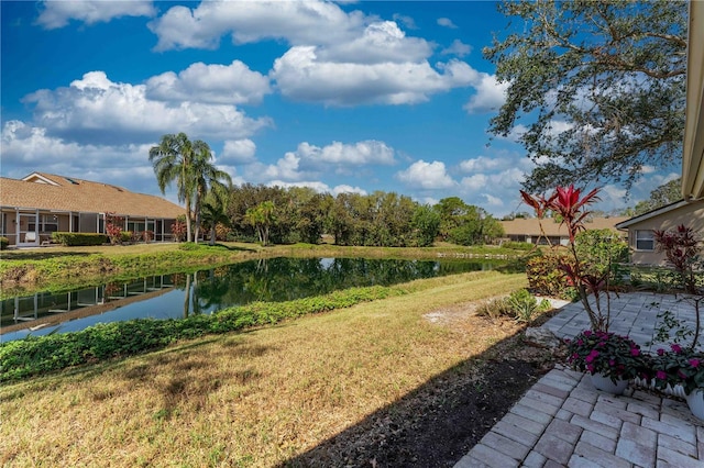 5618 Monte Rosso Rd, Sarasota, FL 34243 - exterior space featuring a water view and a lawn