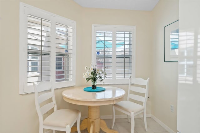 5618 Monte Rosso Rd, Sarasota, FL 34243 - dining room featuring light tile patterned floors