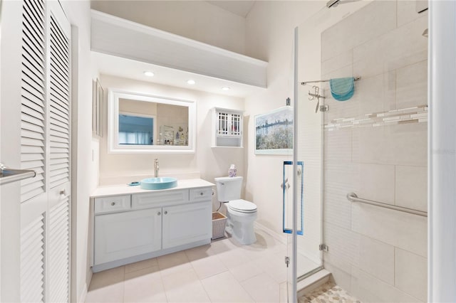 5618 Monte Rosso Rd, Sarasota, FL 34243 - bathroom with vanity, toilet, an enclosed shower, and tile patterned flooring