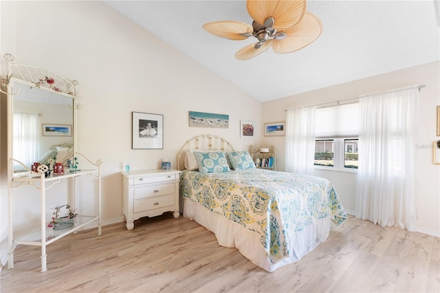 5618 Monte Rosso Rd, Sarasota, FL 34243 - bedroom with light hardwood / wood-style flooring, vaulted ceiling, and ceiling fan