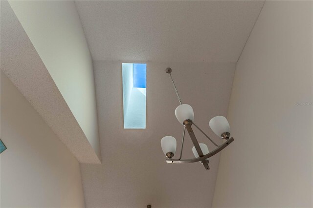 5618 Monte Rosso Rd, Sarasota, FL 34243 - interior details with a notable chandelier
