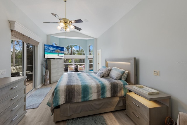 bedroom featuring ceiling fan, lofted ceiling, light wood-type flooring, and access to outside