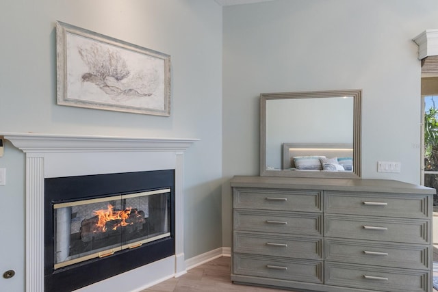 interior details featuring hardwood / wood-style flooring