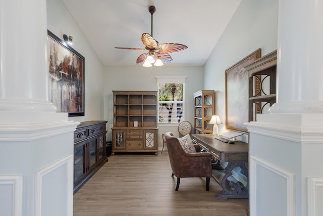 office space with light hardwood / wood-style flooring, ceiling fan, and vaulted ceiling