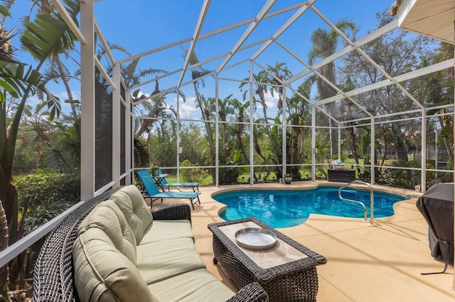 view of pool with a lanai, an outdoor hangout area, and a patio