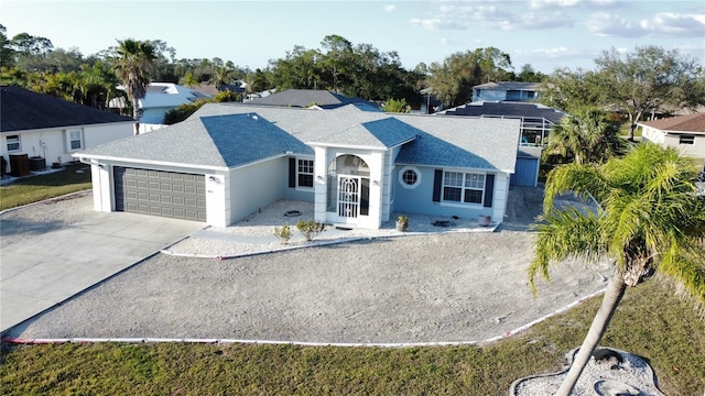 ranch-style home with a garage