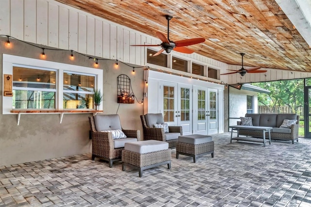 view of patio featuring an outdoor hangout area, ceiling fan, and french doors