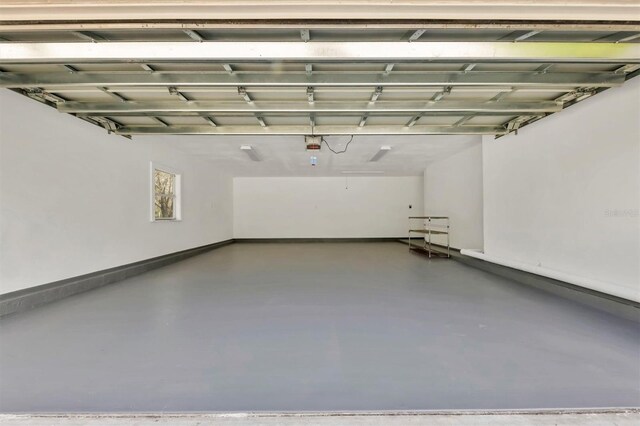 garage featuring baseboards