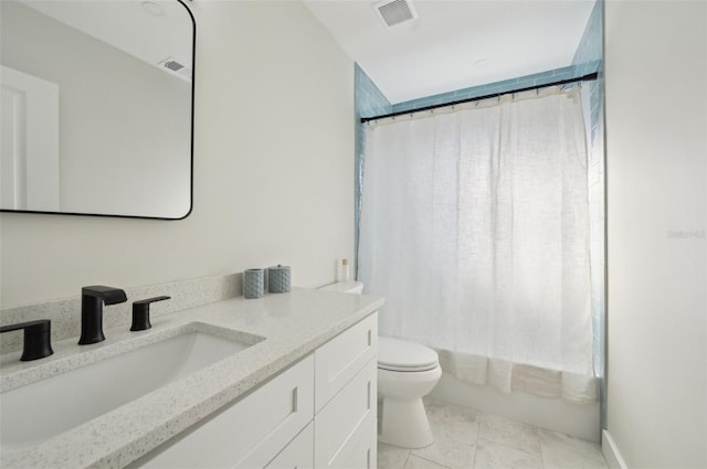 full bathroom with shower / bath combination with curtain, tile patterned floors, vanity, and toilet