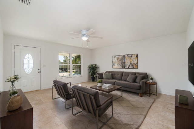 living room featuring ceiling fan