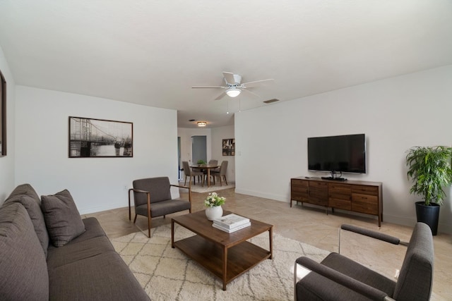 living room with ceiling fan